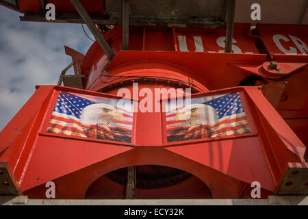 American Eagle flags on crane on construction site in Manhattan, New York City. Stock Photo