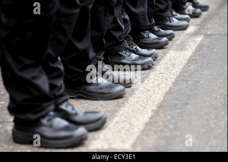 Detail with black military boots in a row during parade Stock Photo