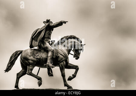 Sculpture of Man On Horse in a Houston TX Park Stock Photo