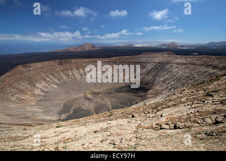Volcanic landscape, Fire Mountains, volcanoes, crater of the Caldera Blanca volcano, Lanzarote, Canary Islands, Spain Stock Photo