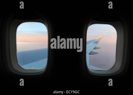 Sunrise seen from the window seat of a Boeing 747-400 Stock Photo