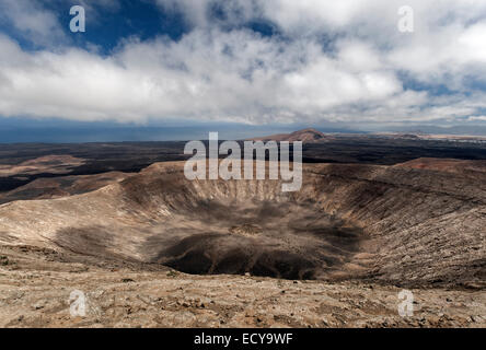 Volcanic landscape, Fire Mountains, volcanoes, crater of the Caldera Blanca volcano, Lanzarote, Canary Islands, Spain Stock Photo