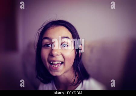 Mixed race girl laughing Stock Photo