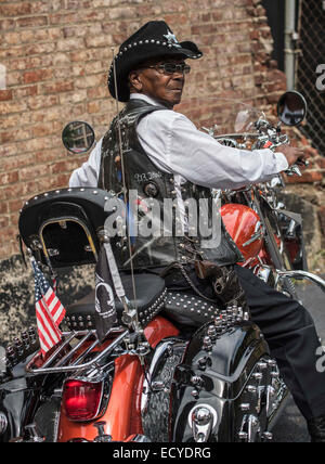 Senior African American man riding motorcycle Stock Photo