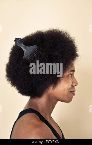 African American man wearing comb in afro hairstyle Stock Photo