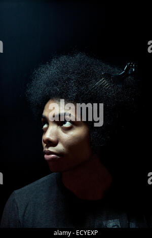 African American man wearing comb in afro hairstyle Stock Photo
