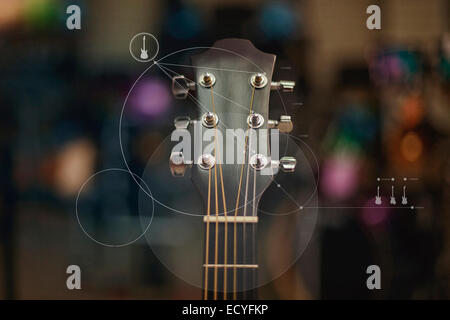 Close up of guitar overlaid with graphic design Stock Photo