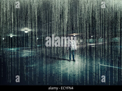 Mixed race girl standing in parking lot under raining binary code Stock Photo