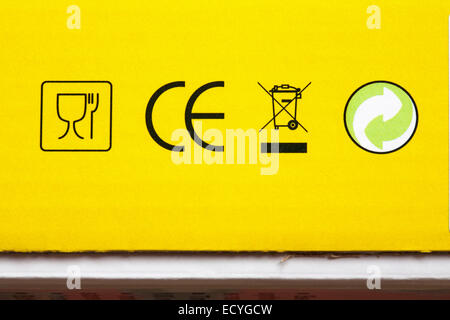 symbols on box - CE marking logo mark, material is approved for food use, recycled, do not throw in bin - disposal recycling recycle logo symbol Stock Photo