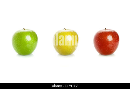 Closeup studio photo of green, yellow and red apples isolated on white background with soft shadow and reflection. Traffic light