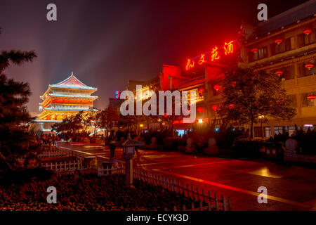 License available at MaximImages.com - Xi'an Drum Tower and hotels at the city downtown, nighttime old city scenery, Shaanxi, China Stock Photo
