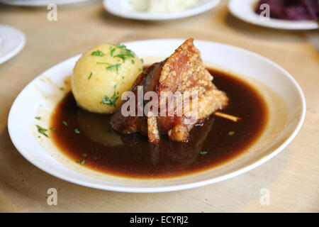 pork knuckle traditional Bavarian food Munich Germany Stock Photo