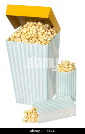A box and two little bags of popcorn on a white background. Stock Photo