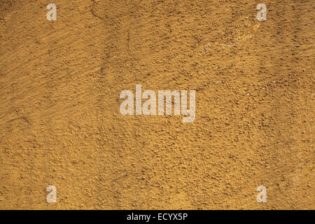 Old yellow wall. Background texture. Stock Photo