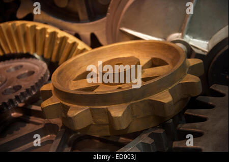 Machine cogs moody lighting in large motor close-up Stock Photo