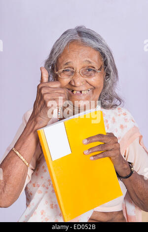 1 indian Old Senior Woman reading Book Stock Photo