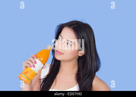 1 indian Beautiful  Lady Drinking Fruit Juice Stock Photo