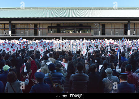 Tokyo, Japan. 23rd Dec, 2014. Japan's Emperor Akihito, accompanied by members of his family, appears on the veranda of the Imperial Palace in Tokyo, waving to hundreds of well-wishers celebrating the monarch's 81st birthday on Tuesday, December 23, 2014. They are, from left: Princess Masako, wife of Crown Prince Naruhito; Naruhito; Akihito; Empress Michiko; Prince Akishino, Akihitos second son; Princess Kiko, Akishinos wife; and Princess Mako, Akishinos daughter. Credit:  Natsuki Sakai/AFLO/Alamy Live News Stock Photo