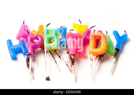 Used birthday candles isolated on white background. Stock Photo