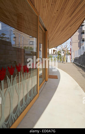 Chigasaki Zion Christian Church/Mihato Kindergarten, Chigasaki-shi, Japan. Architect: Tezuka Architects, 2013. Side view. Stock Photo