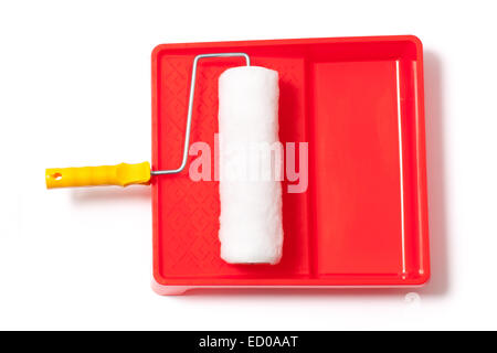 New paint tray and roller isolated on white background. Stock Photo