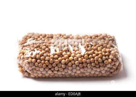 Chickpeas, packaged in a plastic bag isolated on white. Stock Photo