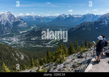 Canada, Alberta, Banff National Park, Two people looking at view from Sulphur Mountain Stock Photo