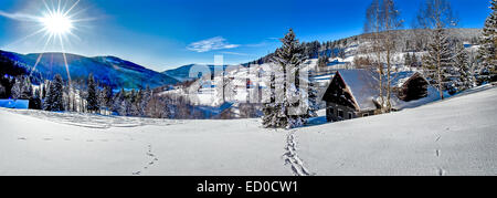 sunny winter day in mountain countryside Stock Photo