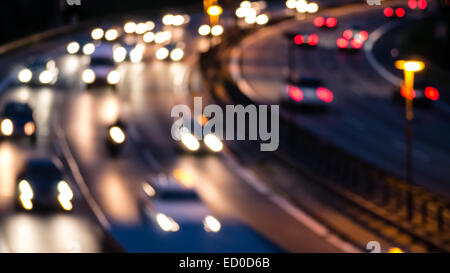 car lights on highway by night Stock Photo