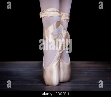 Ballerina standing en pointe Stock Photo