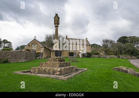 War memorial on the green The Square Guiting Power The Cotswolds Gloucestershire England Stock Photo