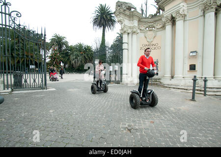 Rome Italy. 23rd December 2014. Visitors arrive on  segways at at the Rome biopark which houses a diverse range of exotic animal  species Stock Photo