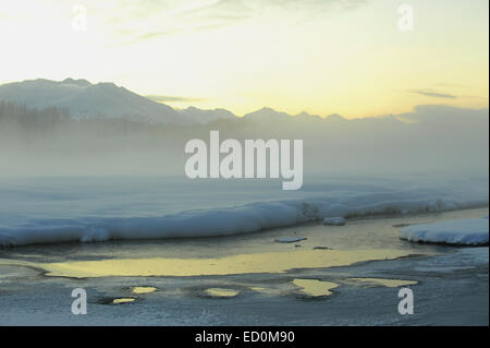 The Chilkat Valley under a covering of snow, with mountains behind. Southeast Alaska. Stock Photo