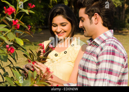 2 indian couple park Plant-Life Stock Photo