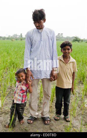 indian rural father with child field Stock Photo