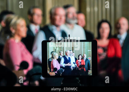 Belfast, Northern Ireland. 23 Dec 2014 - Deputy First Minister Martin McGuinness, and party president Gerry Adams (Sinn Fein) give their reaction to the agreement made between the Northern Ireland executive parties, and the British and Irish Governments Credit:  Stephen Barnes/Alamy Live News Stock Photo