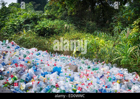 Empty plastic bottles piled up in a park at on of the major tourist attractions in Zhanjiajie, China 2014 Stock Photo