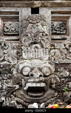 Some of the Hindu stone statues and sculptures decorating the temple Pura Desa Ubud. Ubud. Bali. The Ubud Monkey Forest is a nat Stock Photo