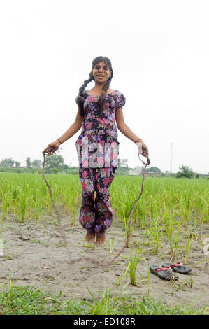 1 indian girl roop playing farm Stock Photo