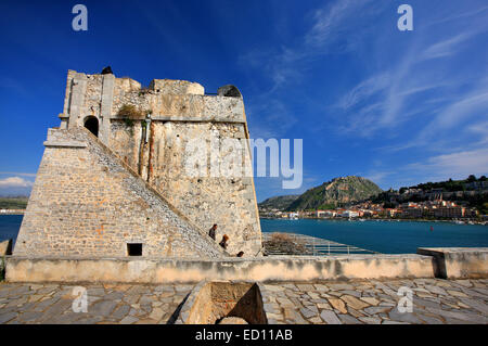 Inside view of Bourtzi castle upon a tiny island, with Nafplio town and Palamidi castle in the background,  Greece Stock Photo