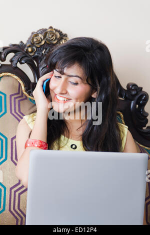 1 indian lady Home  talking phone Stock Photo