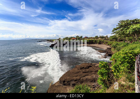 Coast near Tanah Lot at sunny day, Bali, Indonesia Stock Photo