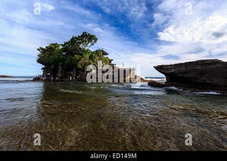 Tahah Lot - Hindu Temple at sunny day, Bali, Indonesia Stock Photo