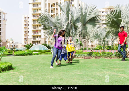 indian Parents with children  park fun Stock Photo