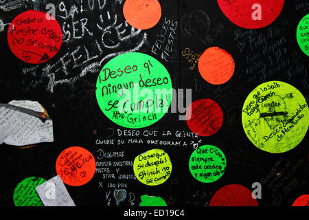 La Paz, Bolivia. 23rd Dec, 2014. Message from someone pretending to be The Grinch wishing that no-ones wishes will come true on a board for people to write their Christmas wishes in a plaza in the city centre. Credit:  James Brunker / Alamy Live News Stock Photo