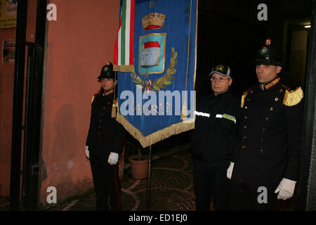 Naples, Italy. 23rd Dec, 2014. Local residents and family of the late victims paying homage of 'Train 904 Bombing' with the support of the City of Casoria represented by Mayor Vincenzo Carfora. The Train 904 bombing, also known as the Christmas Massacre, was a terror attack which occurred on December 23, 1984, in the Apennine Base Tunnel. A bomb on the 904 express train (Rapido 904) from Naples to Milan was detonated, killing 17 and wounding 267. Credit:  Salvatore Esposito/Pacific Press/Alamy Live News Stock Photo