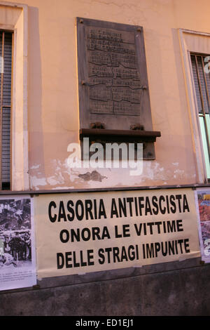 Naples, Italy. 23rd Dec, 2014. Local residents and family of the late victims paying homage of 'Train 904 Bombing' with the support of the City of Casoria represented by Mayor Vincenzo Carfora. The Train 904 bombing, also known as the Christmas Massacre, was a terror attack which occurred on December 23, 1984, in the Apennine Base Tunnel. A bomb on the 904 express train (Rapido 904) from Naples to Milan was detonated, killing 17 and wounding 267. Credit:  Salvatore Esposito/Pacific Press/Alamy Live News Stock Photo