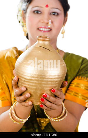 1 South  indian Lady saving money Piggy Bank Stock Photo