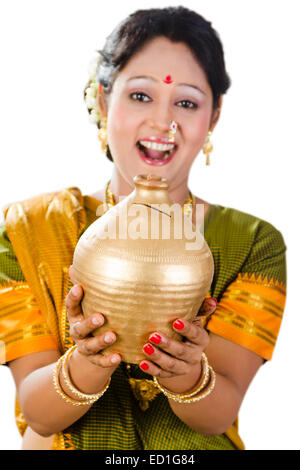 1 South  indian Lady saving money Piggy Bank Stock Photo