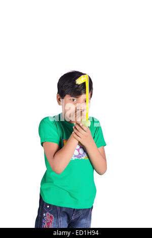 1 indian child boy playing Stock Photo